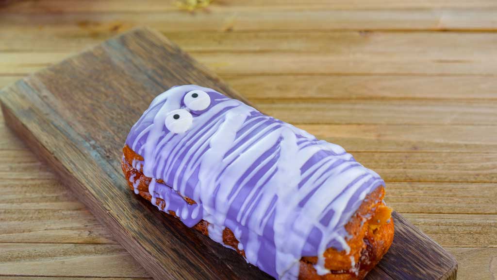 At Schmoozies! at Disney California Adventure Park, guests will find these mummy-inspired donuts filled with peanut butter and jelly. (David Nguyen/Disneyland Resort)
