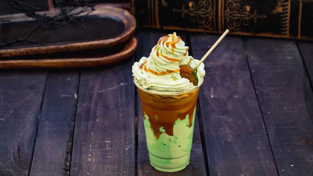 At Schmoozies! at Disney California Adventure Park, guests will find this caramel apple smoothie made with real apples, ice cream, caramel sauce and caramel apple lollipop. (David Nguyen/Disneyland Resort)