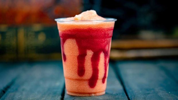 At Galactic Grill at Disneyland Park, guests will find this Blood Orange Slush with a swirl of raspberry sauce. (David Nguyen/Disneyland Resort)