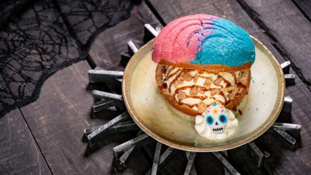 At Rancho del Zocalo at Disneyland Park, guests will find this Pan Dulce Ice Cream Sandwich featuring colorful shell-like Mexican sweet bread with dulce de leche ice cream, cajeta, and churro streusel. (David Nguyen/Disneyland Resort)
