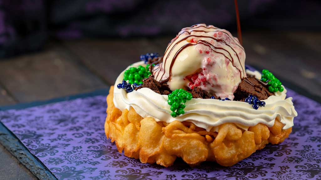 At Hungry Bear Restaurant at Disneyland Park, guests will find this Dead-Cadent Funnel Cake with decadent brownie, white chocolate raspberry ice cream, and chocolate crispy pearls. (David Nguyen/Disneyland Resort)