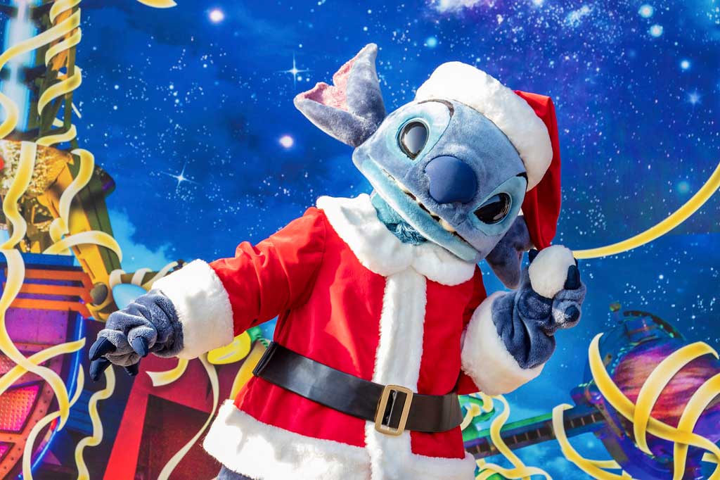 Santa Stitch will make his debut greeting guests at the Comet Café in Tomorrowland.
