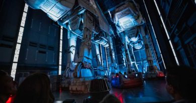 Guests race past massive AT-AT walkers aboard a First Order Star Destroyer as part of Star Wars: Rise of the Resistance, the groundbreaking new attraction opening Dec. 5, 2019, inside Star Wars: Galaxy’s Edge at Disney’s Hollywood Studios in Florida and Jan. 17, 2020, at Disneyland Park in California. (Matt Stroshane, photographer)