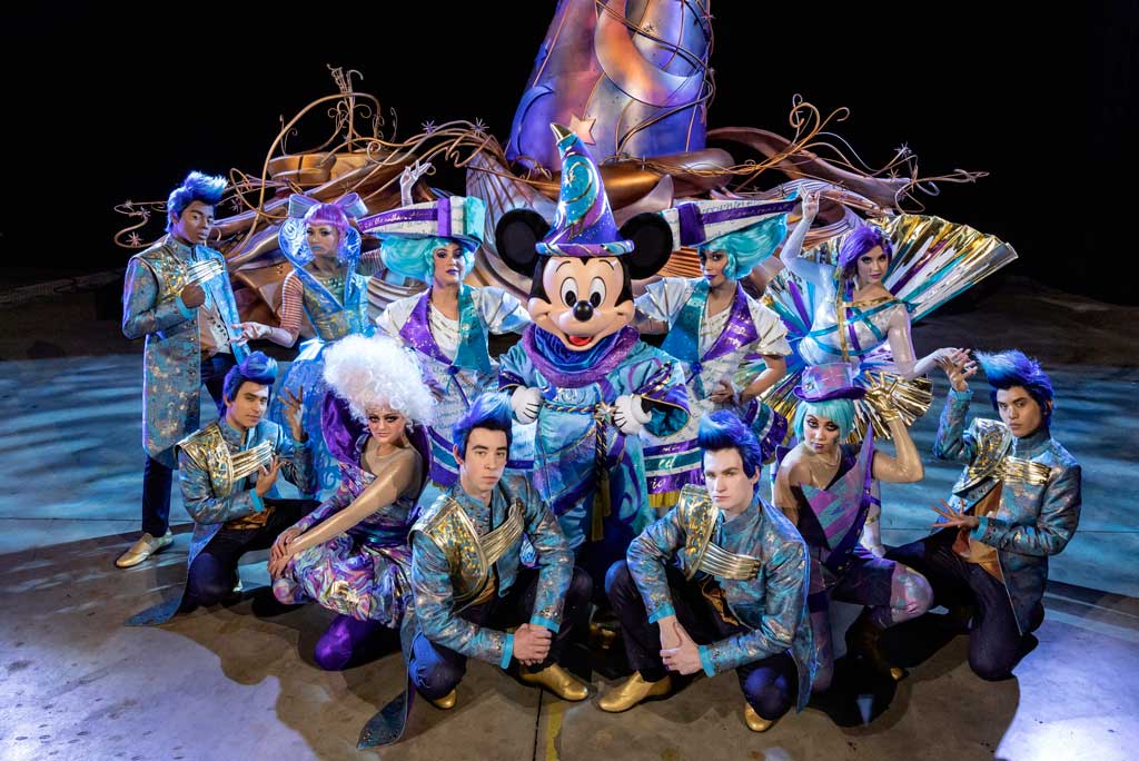 Pictured during a backstage rehearsal of the “Magic Happens” parade set to debut at Disneyland Park in California Feb. 28, 2020, Mickey Mouse, in an all-new sorcerer-inspired costume, will lead the way from atop a 15-foot tall iridescent magical hat. Performers, known as “magic makers,” represent stylized aspects of “Disney magic” – from beauty to strength and everything in between. The parade will come to life with an energetic musical score and new songs and will feature stunning floats, beautiful costumes and beloved Disney characters. (Joshua Sudock/Disneyland Resort)