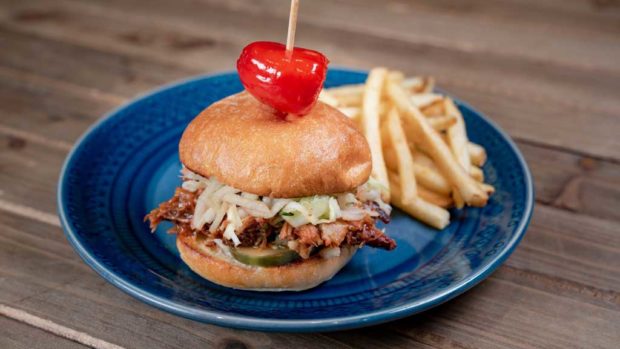 Brisket slider – shredded, smoked BBQ brisket piled on slider buns with apple slaw and pickle, served with french fries.