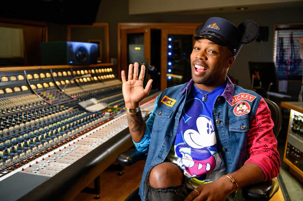Singer-songwriter Todrick Hall smiles for a photo while working on the music for the all-new “Magic Happens” parade, which debuts at Disneyland Park on Feb. 28, 2020. “Magic Happens” will feature an energetic musical score and new songs, co-composed by Hall. This new parade, led by Mickey Mouse and his pals, celebrates the awe-inspiring moments of magic that are at the heart of so many Disney stories. (Richard Harbaugh/Disneyland Resort)