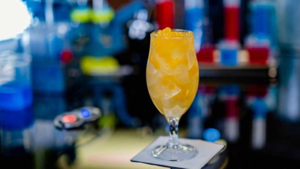 The Regulator, features Patron Silver tequila, lime juice, habanero and mango syrup, Golden Road Mango Cart wheat ale and garnished with mango flavored popping pearls. (David Nguyen/Disneyland Resort)