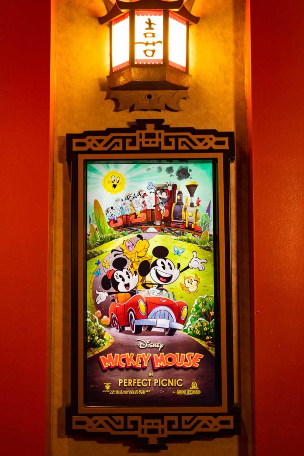 A poster for “Perfect Picnic” is found in the lobby of the Chinese Theater inside Disney’s Hollywood Studios at Walt Disney World Resort in Lake Buena Vista, Fla. “Perfect Picnic” is a new “Mickey Mouse” cartoon short written by Walt Disney Imagineering and produced by Disney Television Animation that serves as guests’ entry into the story of Mickey & Minnie’s Runaway Railway, the new ride-through attraction opening March 4, 2020, at Disney’s Hollywood Studios. (Matt Stroshane, photographer)