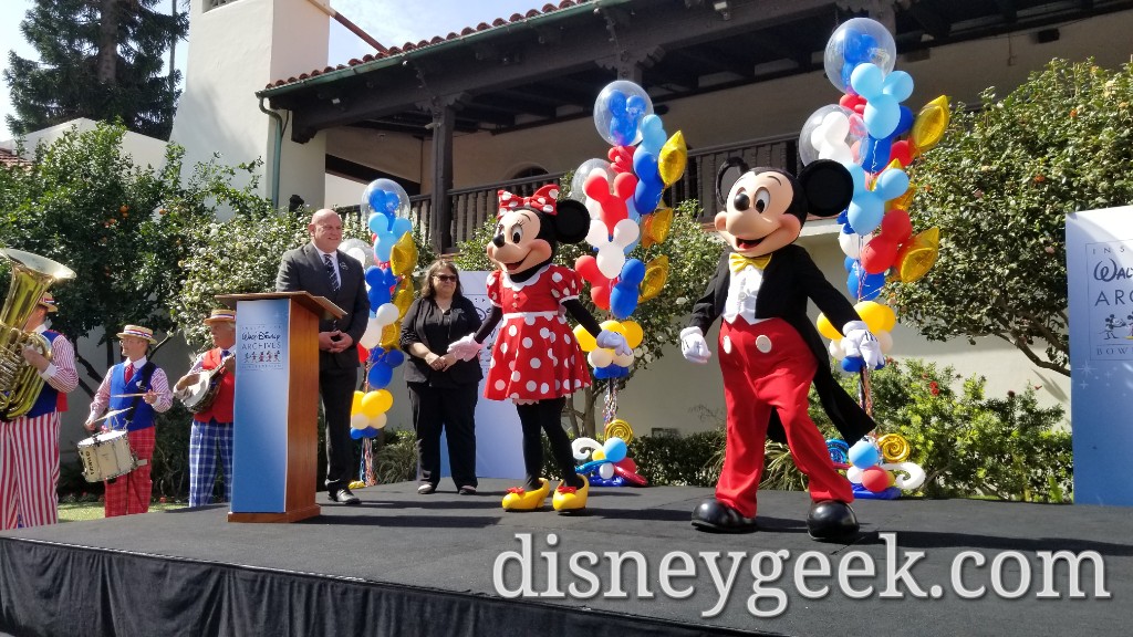 Minnie Mouse & Mickey Mouse arrive for the ribbon cutting