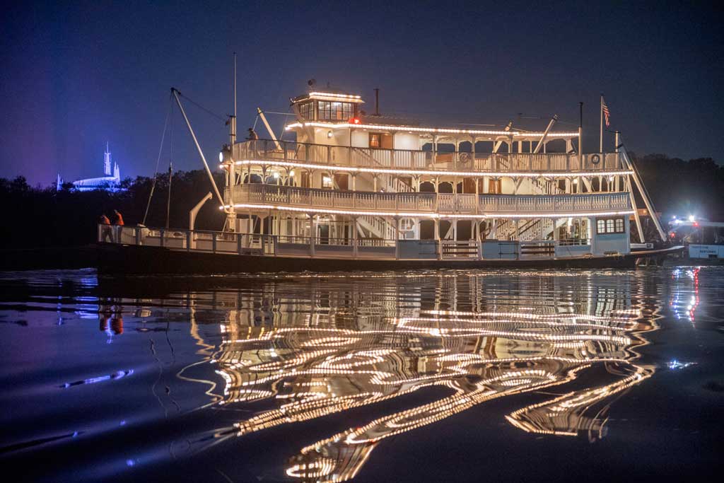 The Liberty Belle riverboat crosses in front of Magic Kingdom Park at Walt Disney World Resort in Lake Buena Vista, Fla., during an overnight repositioning following a nearly complete scheduled refurbishment. It was a rare sight to behold, as crews towed the 47-foot-tall classic steam ship back to her home in Liberty Square. (Kent Phillips, photographer)