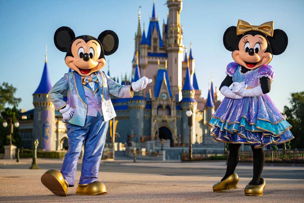Beginning Oct. 1, 2021, Mickey Mouse and Minnie Mouse will host “The World’s Most Magical Celebration” honoring Walt Disney World Resort’s 50th anniversary in Lake Buena Vista, Fla. They will dress in sparkling new looks custom made for the 18-month event, highlighted by embroidered impressions of Cinderella Castle on multi-toned, EARidescent fabric punctuated with pops of gold. (Matt Stroshane, photographer) 