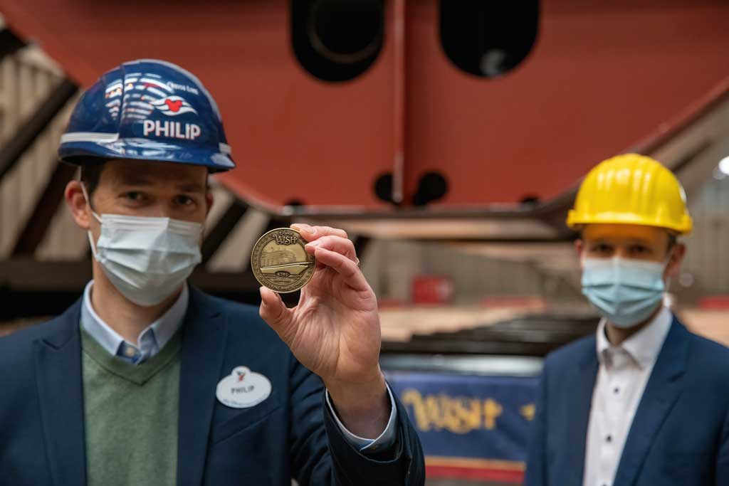 Philip Gennotte, portfolio project management executive, Walt Disney Imagineering Germany and Jan Meyer, chief executive office of Meyer Werft celebrated the keel laying ceremony for the Disney Wish in Papenburg, Germany. (Robert Fiebak, photographer) 