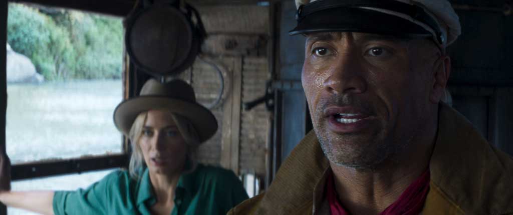 Emily Blunt as Lily Houghton and Dwayne Johnson as Frank Wolff in Disney’s JUNGLE CRUISE. Photo courtesy of Disney. © 2021 Disney Enterprises, Inc. All Rights Reserved.