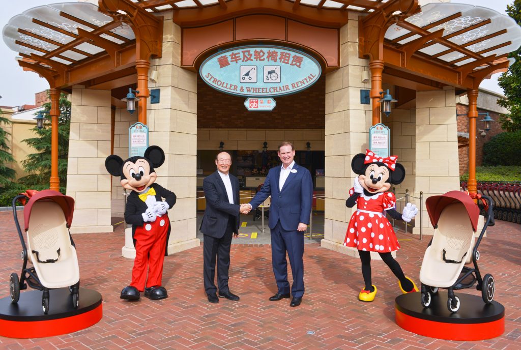 Joe Schott, President and General Manager of Shanghai Disney Resort, and Song Zhenghuan, Founder and Chairman of Goodbaby Group celebrating the two parties entering into a multi-year resort alliance at Shanghai Disney Resort