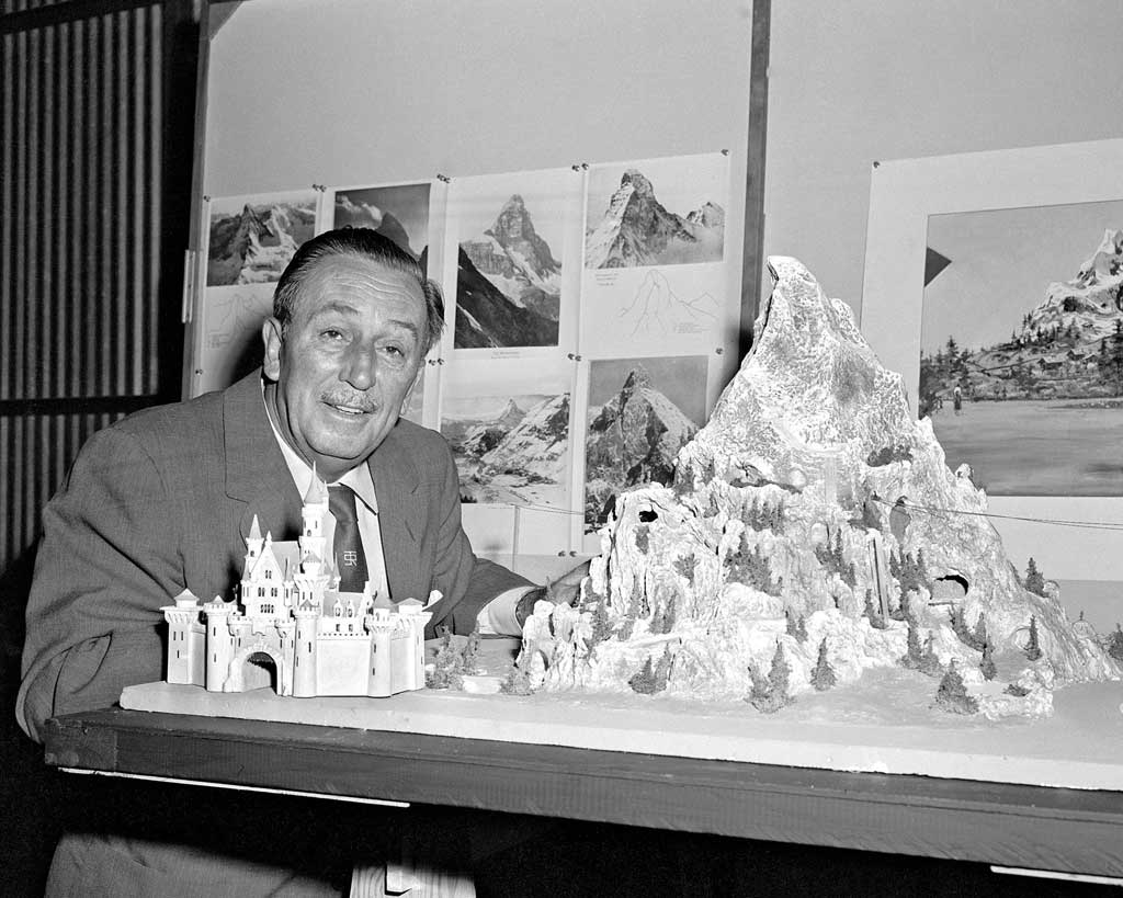MATTERHORN MODEL (1958) -- Walt Disney reviews a model for the Matterhorn Bobsleds which opened in 1959 at a height of 147 feet.