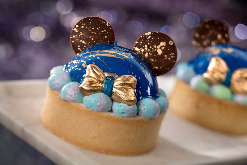 The special food and beverage offerings for the 50th Anniversary of Walt Disney World are full of whimsy and EARidescent shimmer, like the 50th Celebration Tart available at The Market at Ale & Compass at Disney’s Yacht & Beach Club Resorts at Walt Disney World Resort in Lake Buena Vista, Fla. (Kent Phillips, photographer).