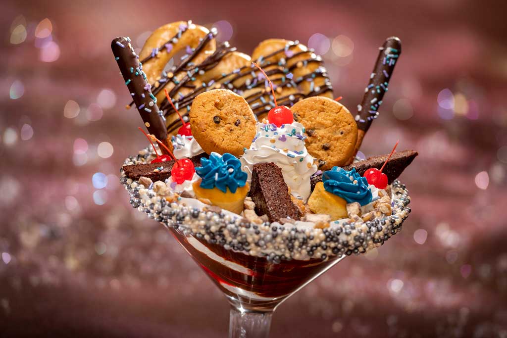 The special food and beverage offerings for the 50th Anniversary of Walt Disney World are full of whimsy and EARidescent shimmer, like the Cheers to 50 Years! sundae available at Plaza Restaurant at Magic Kingdom Park at Walt Disney World Resort in Lake Buena Vista, Fla. (Kent Phillips, photographer).