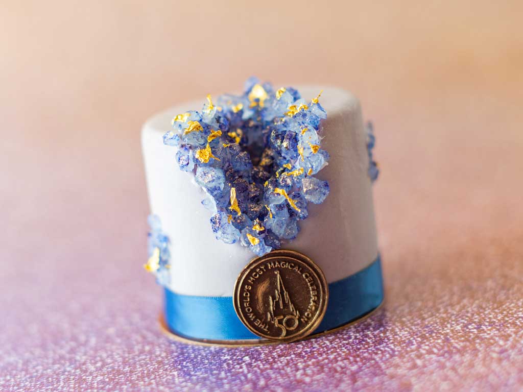 The special food and beverage offerings for the 50th Anniversary of Walt Disney World are full of whimsy and EARidescent shimmer, like the 50th Celebration Petit Cake available at Amorette’s Patisserie at Disney Springs at Walt Disney World Resort in Lake Buena Vista, Fla. (Kent Phillips, photographer).