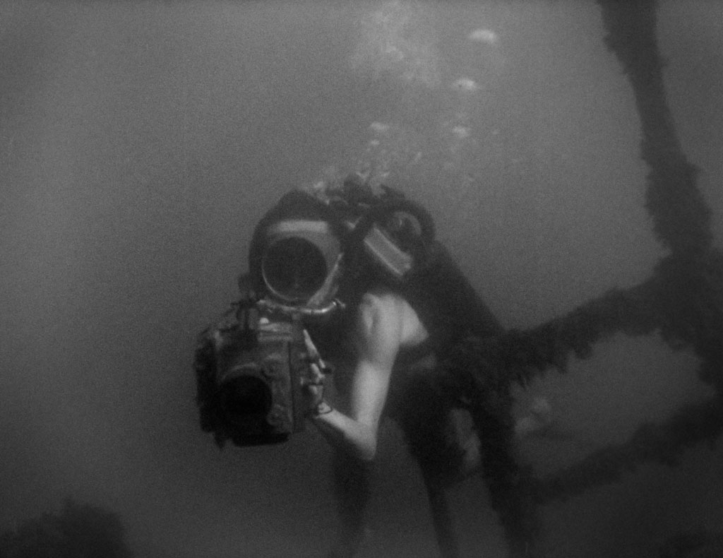Jacques Cousteau films an underwater shipwreck in the Mediterranean Sea in 1943. (Credit: The Cousteau Society)