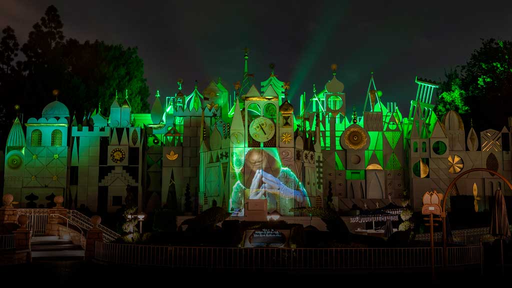For a limited time beginning April 11, 2022, the iconic faade of ÒitÕs a small worldÓ at Disneyland Park becomes enchanted several times each evening with a brief visual montage that pays tribute to Walt Disney Animation StudiosÕ ÒEncantoÓ hit song, ÒWe DonÕt Talk About Bruno.Ó This musical delight comes to life through projection and lighting effects and an artistic style inspired by the lyrics, with select moments that feature characters from the film. Like the Madrigal familyÕs Casita, tiles across the ÒitÕs a small worldÓ faade flip, turn, and rearrange themselves as one scene transitions to the next, culminating in a celebratory chorus and a nod to BrunoÕs mysterious prophecy about Mirabel. Walt Disney Animation StudiosÕ ÒEncantoÓ recently won the Academy Award¨ for best animated feature at this yearÕs Oscars¨, and a new sing-along version of the film is streaming on Disney+. (Christian Thompson/Disneyland Resort)