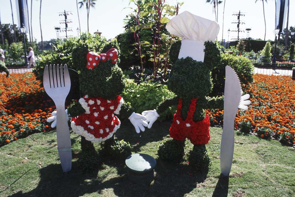 Mickey Mouse and Minnie Mouse topiaries celebrate the EPCOT Food & Wine Festival in 2000 at Walt Disney World Resort in Lake Buena Vista, Fla. (Disney)