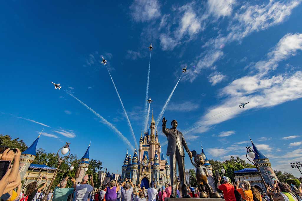  U.S. Air Force Thunderbirds fly over Cinderella Castle at Magic Kingdom Park at Walt Disney World Resort in Lake Buena Vista, Fla., Oct. 27, 2022, as a prelude to the beginning of National Veterans and Military Families Month in November. (Olga Thompson, Photographer) 