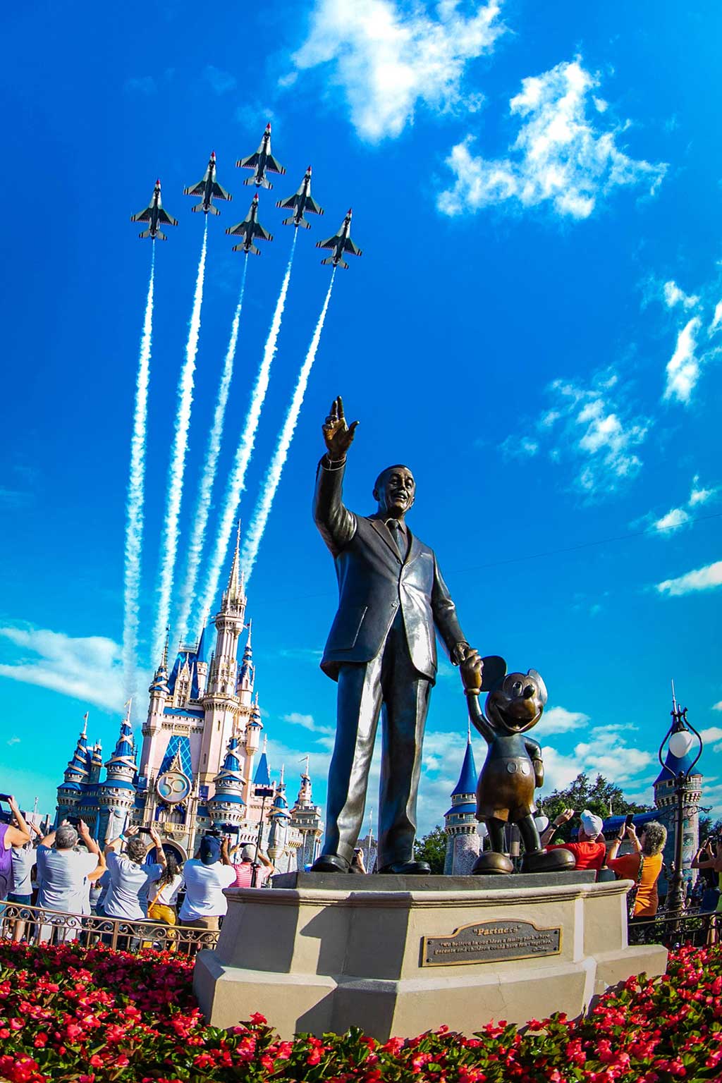  U.S. Air Force Thunderbirds fly over Cinderella Castle at Magic Kingdom Park at Walt Disney World Resort in Lake Buena Vista, Fla., Oct. 27, 2022, as a prelude to the beginning of National Veterans and Military Families Month in November. (Olga Thompson, Photographer) 