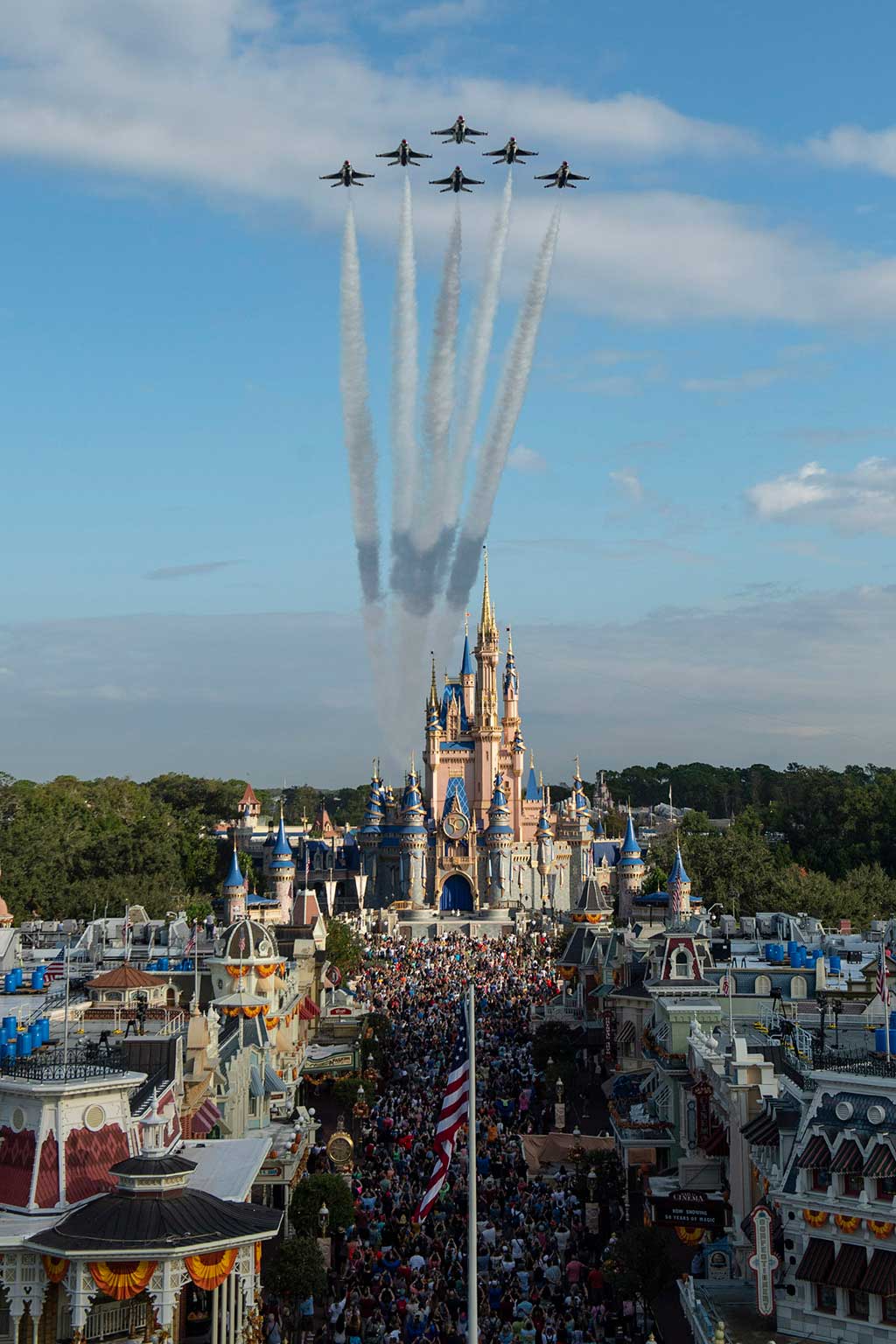 U.S. Air Force Thunderbirds fly over Cinderella Castle at Magic Kingdom Park at Walt Disney World Resort in Lake Buena Vista, Fla., Oct. 27, 2022, as a prelude to the beginning of National Veterans and Military Families Month in November. (David Roark, Photographer) 
