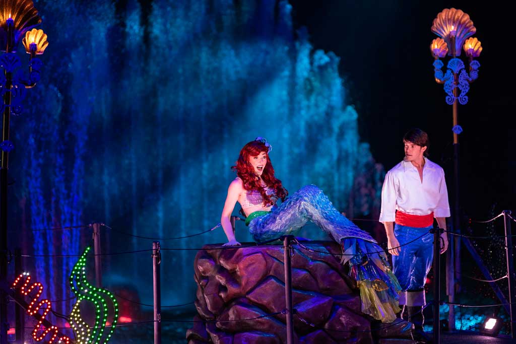 Ariel and Eric float across the water as the air fills with love and romance