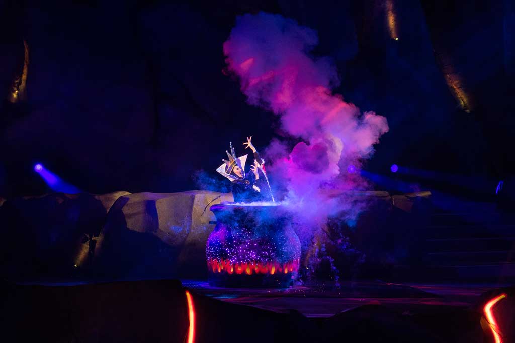 The Evil Queen from “Snow White and the Seven Dwarfs” calls upon other villains to intrude on Mickey’s fantasy and turn his dream into a nightmare