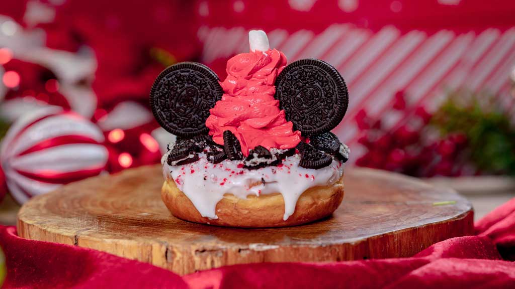 Peppermint Cookie Donut (Jolly Holiday Bakery & Café at Disneyland Park in Anaheim, Calif.) - Specialty donut with peppermint icing, crushed peppermint, chocolate crème-filled cookies and whipped topping.