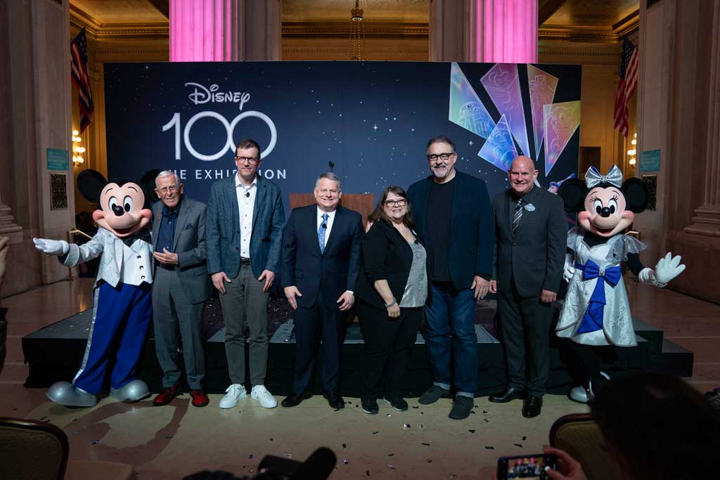(L to R): Mickey Mouse, Semmel Exhibitions Executive Producer and Director Christoph Scholz, The Franklin Institute President and CEO Larry Dubinski, Walt Disney Archives Director Becky Cline, Disney Legend Don Hahn, Walt Disney Archives and D23: The Official Disney Fan Club Vice President Michael Vargo, Minnie Mouse
