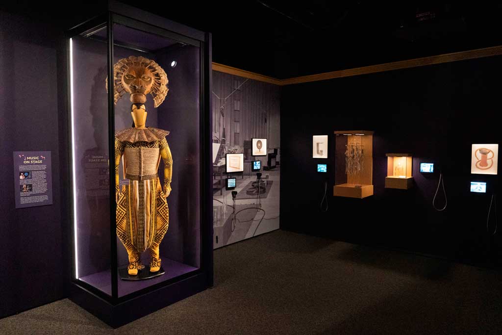 Mufasa costume from The Lion King: The Broadway Musical (1997-present) inside The Magic of Sound and Music gallery at Disney100: The Exhibition, now open at The Franklin Institute in Philadelphia. ©Disney