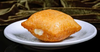 House-filled Beignet ) – featuring lemon ice box pie filling topped with lemon glaze.
