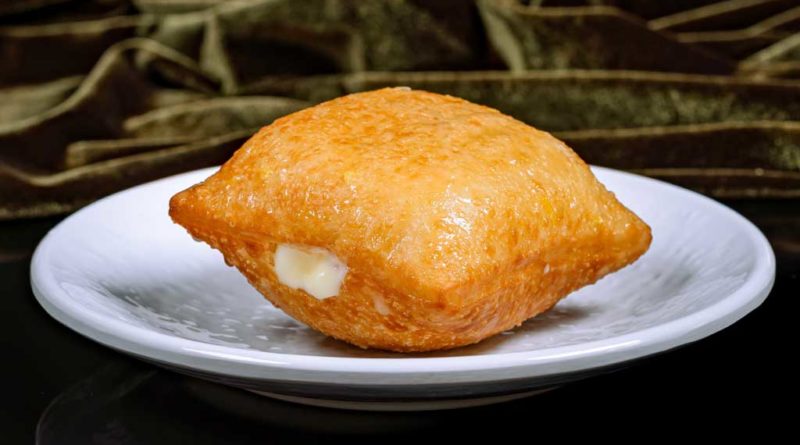 House-filled Beignet ) – featuring lemon ice box pie filling topped with lemon glaze.