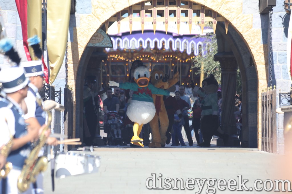 Donald Duck leading the characters out