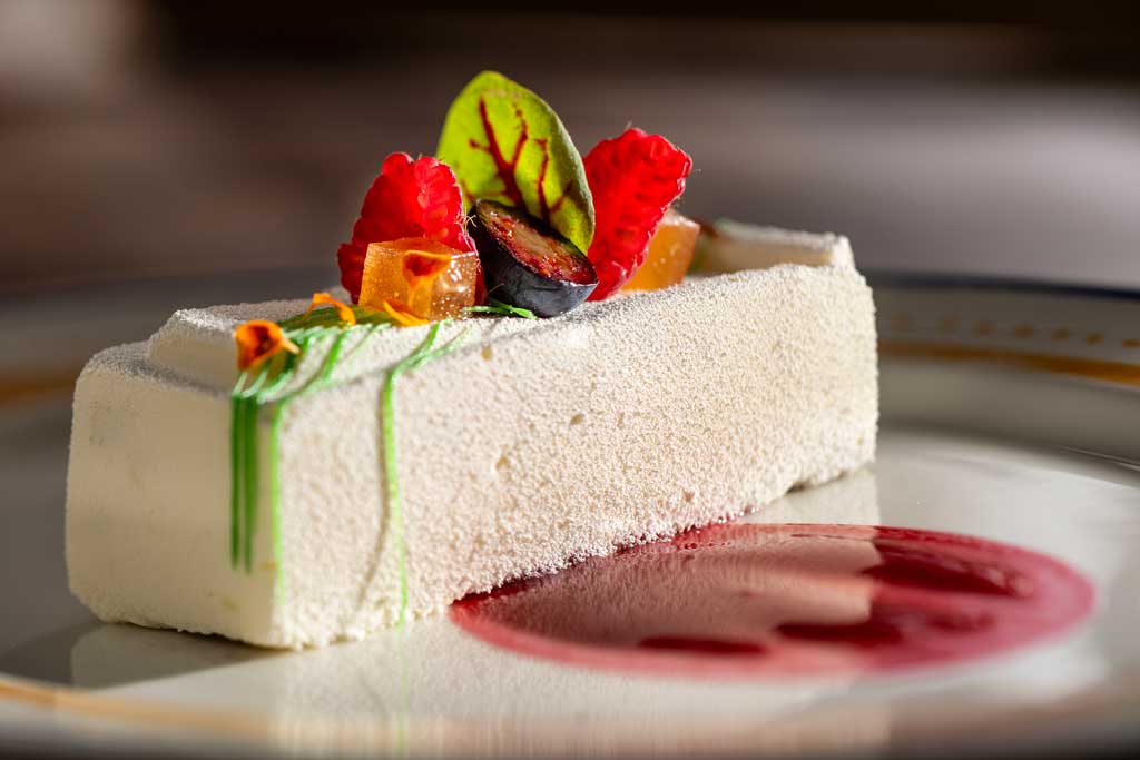 At Plaza de Coco, an array of artful dishes will transport guests to the picturesque town depicted in the Pixar Animation Studios film, “Coco.” The Margarita Lime Cheesecake will feature a sea salt shortbread and raspberry-agave margarita coulis. (Kent Phillips, Photographer)