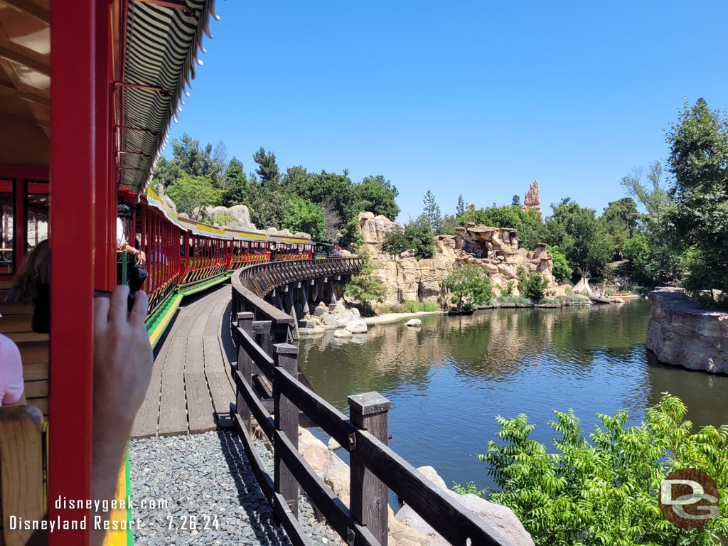 Steaming along the banks of the Rivers of America aboard the Disneyland Railroad