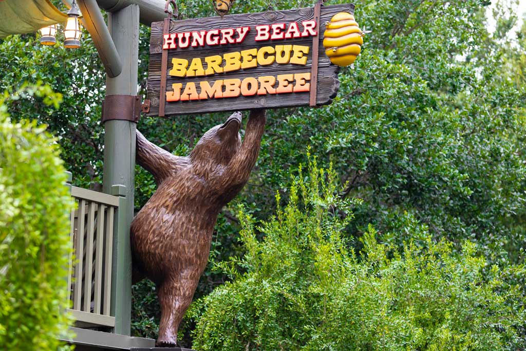 Hungry Bear Barbecue Jamboree will open on Oct. 25, 2024, at Disneyland Resort in Anaheim, Calif. The space has been transformed with a special twist from the Country Bears: guests can enjoy a mouthwatering Smoked Barbecue Combo Platter with a selection of house-smoked meats and other dishes to the Country Bears’ greatest hits. (Christian Thompson/Disneyland Resort)  